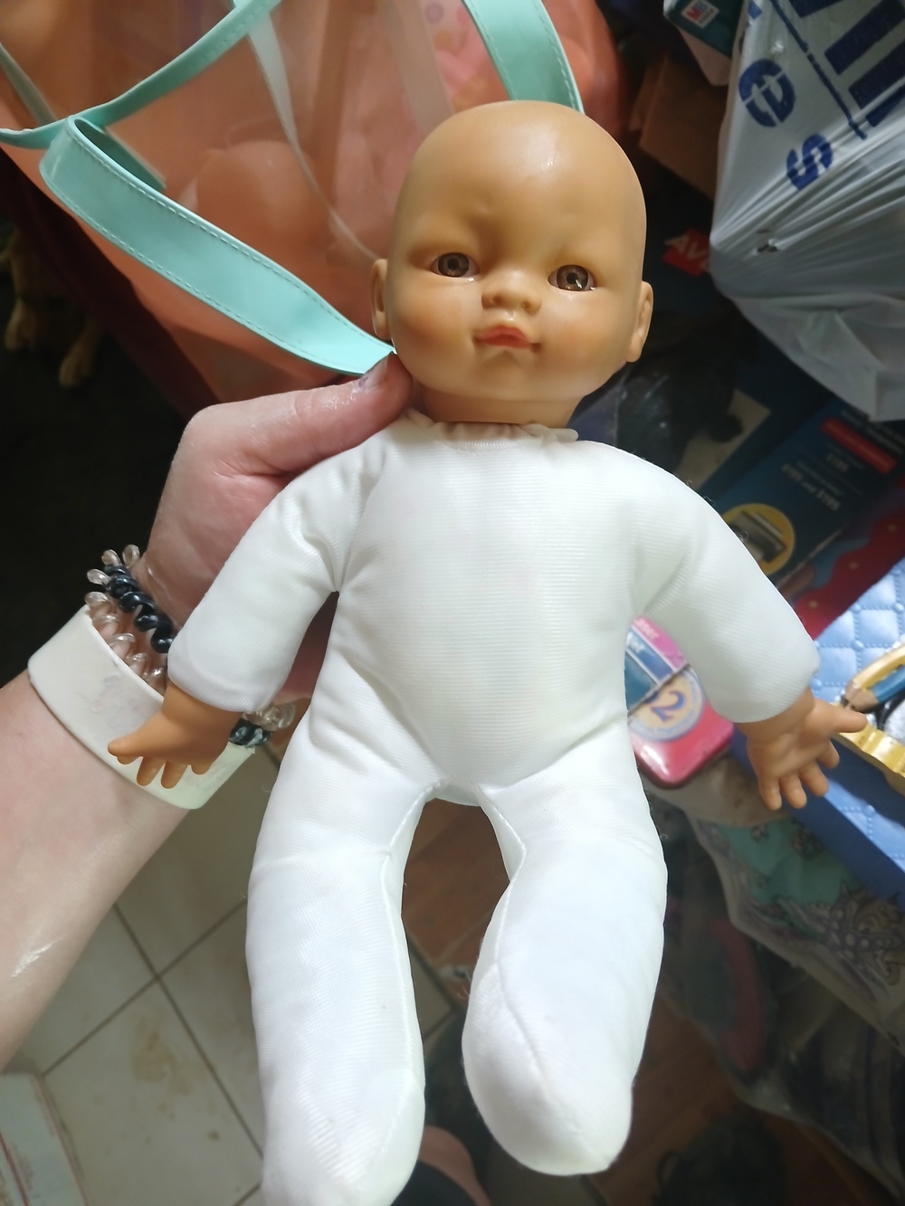Uneeda baby doll with a soft cloth body and vinyl limbs